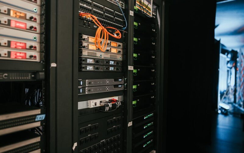 a rack of servers in a server room